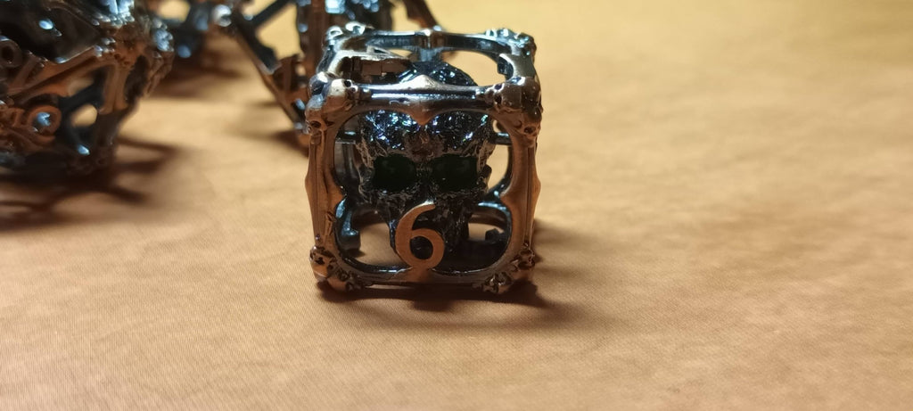 7 x Polyhedral Dice Hollow Metal Skull Silver with Green Eyes Dice
