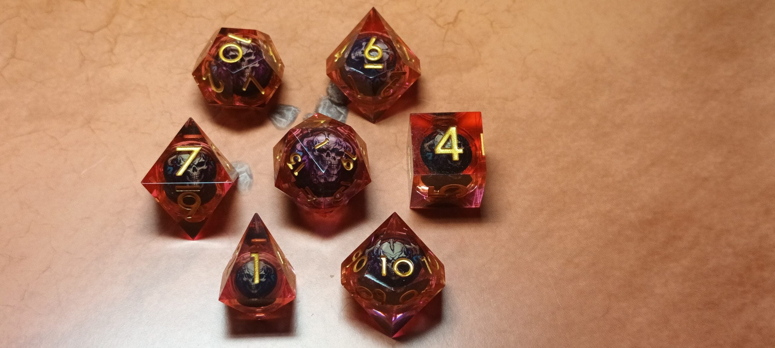 7 x Polyhedral Dice Resin Liquid Core Skull Red with Gold Dice