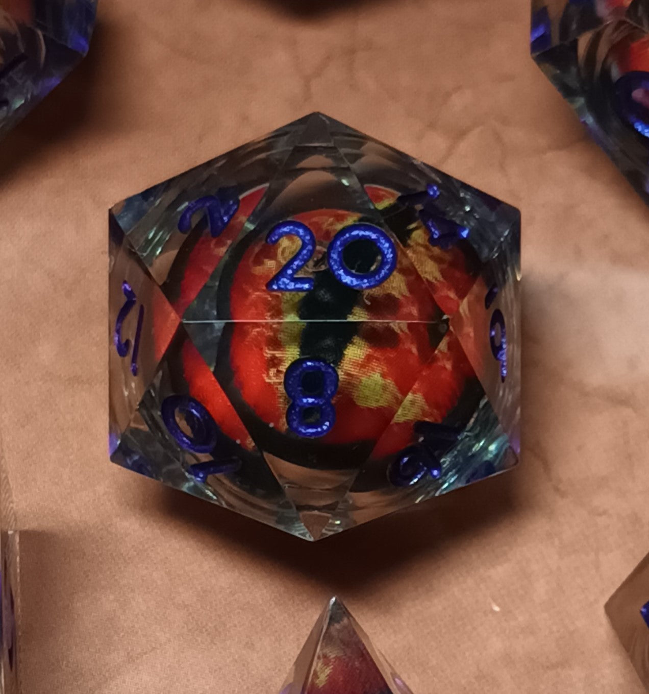 7 x Polyhedral Dice Resin Liquid Core Orange Dragon Eye Clear with Blue Dice
