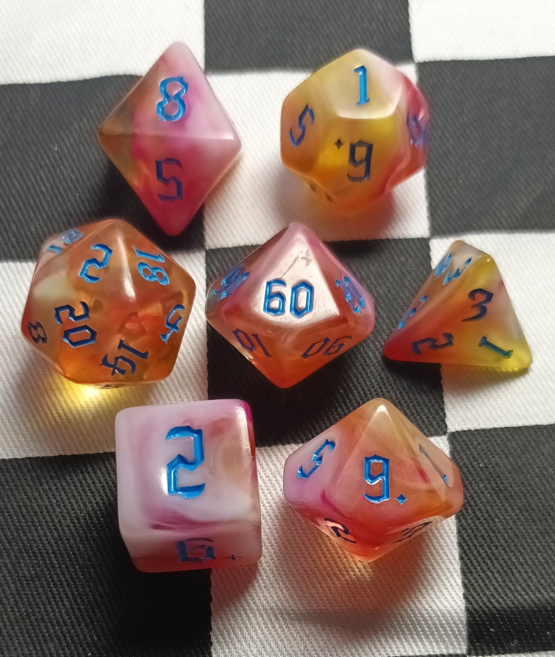 7 x Polyhedral Dice Chaos Mist Pink White Yellow with Blue